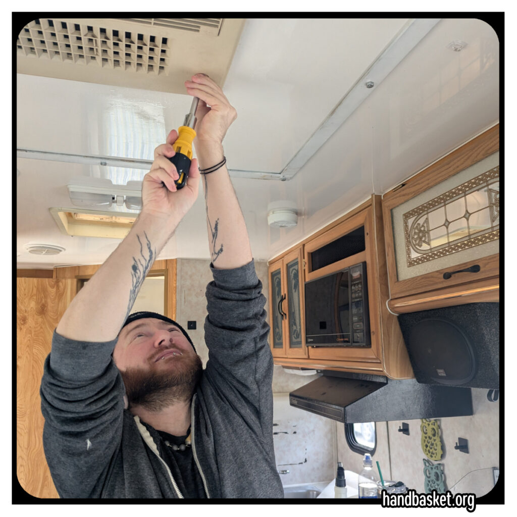 me really needing to trim my beard because it looks like a tattooed sasquatch using a screwdriver to remove a fan cover